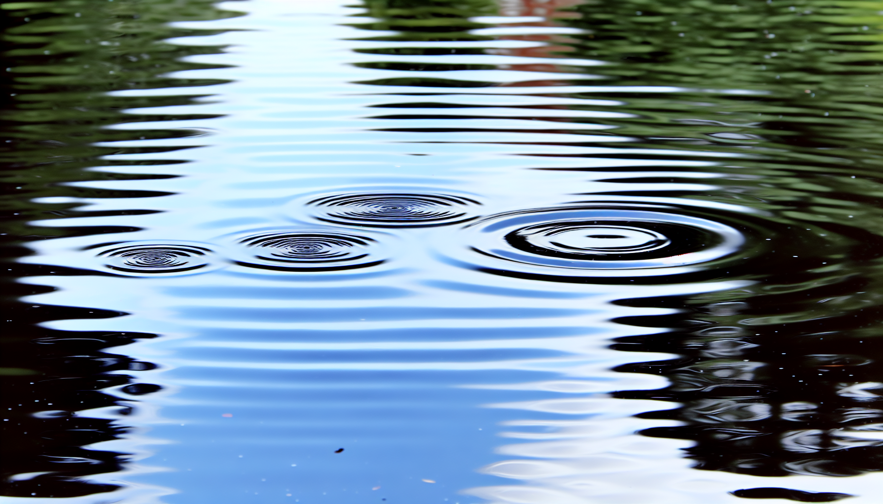 A realistic image of calm ripples spreading in a pond symbolizing the impact of emotional stability in family dynamics.